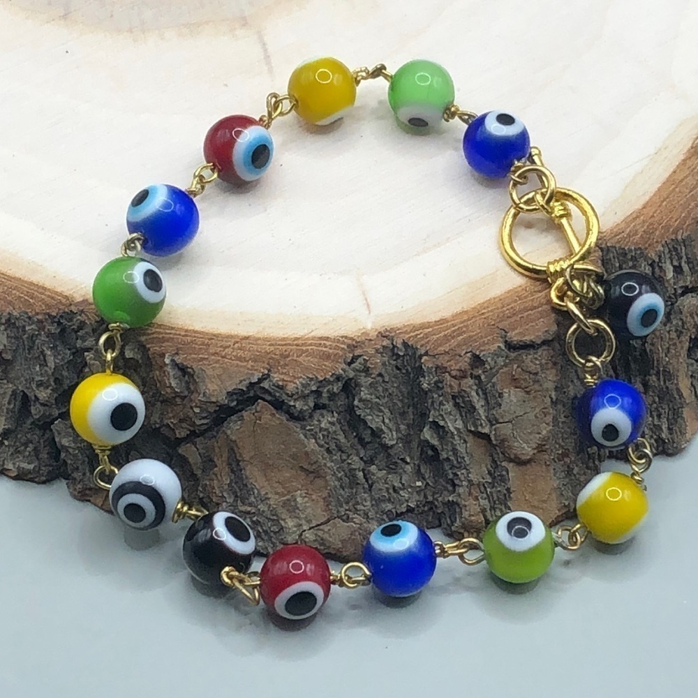 Colorful evil eye glass bead protection bracelet gold tone boho.